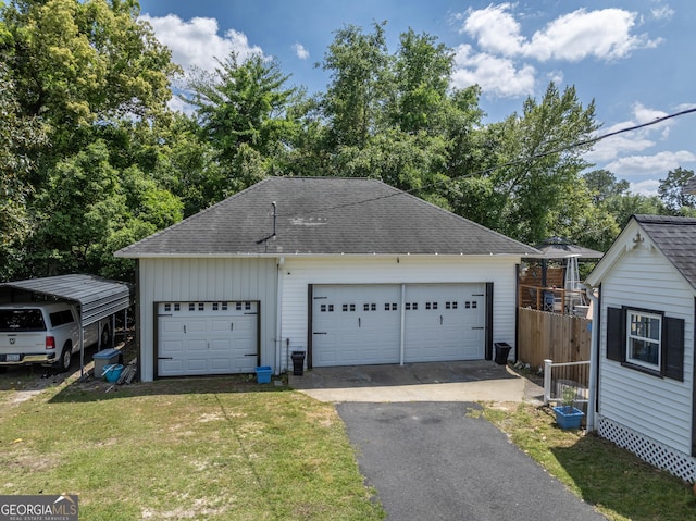 detached garage with fence