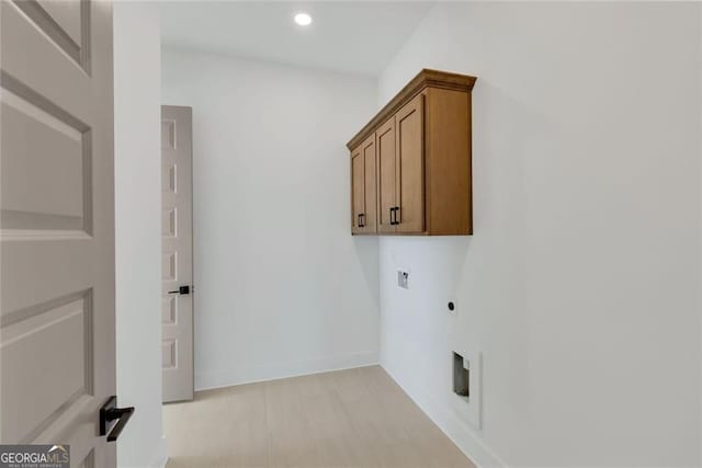laundry room with recessed lighting, baseboards, electric dryer hookup, cabinet space, and washer hookup