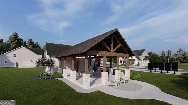 surrounding community with a lawn and a gazebo