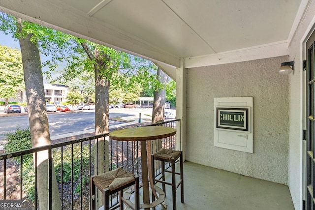 balcony featuring covered porch