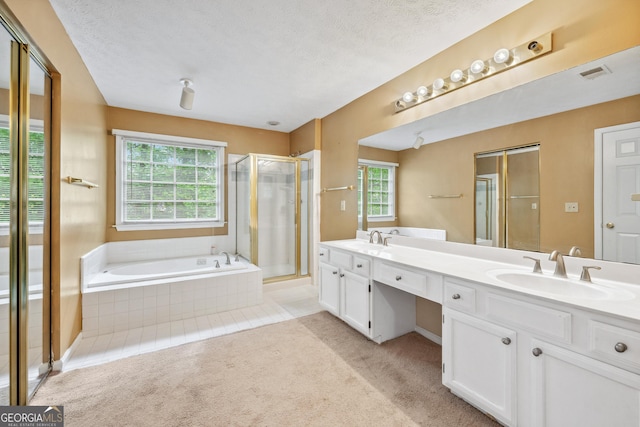 10044 Point View Dr, Jonesboro, GA 30238 - full bath featuring visible vents, a sink, a bath, and a stall shower