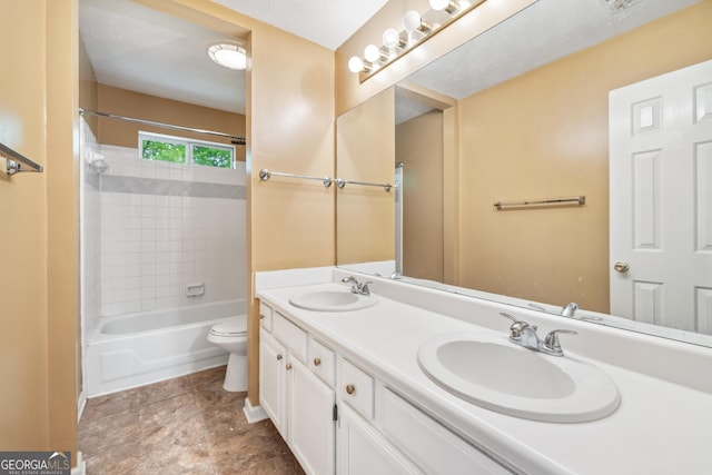 10044 Point View Dr, Jonesboro, GA 30238 - bathroom with double vanity, toilet, a sink, and shower / bathing tub combination