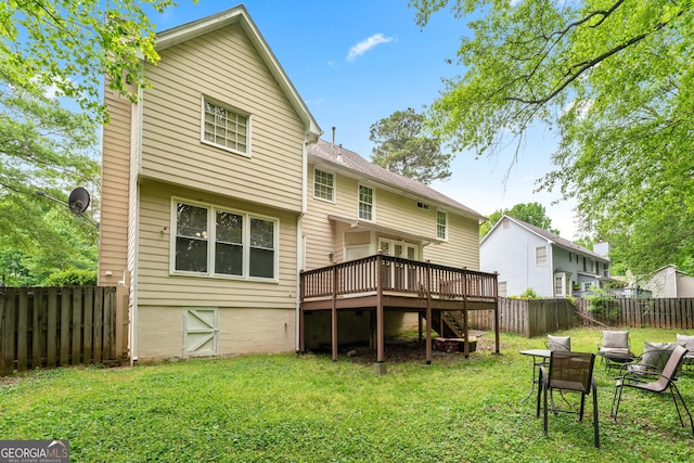 10044 Point View Dr, Jonesboro, GA 30238 - rear view of house with a lawn, stairway, a wooden deck, and a fenced backyard