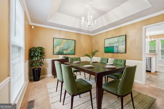 10044 Point View Dr, Jonesboro, GA 30238 - dining area featuring light colored carpet, a tray ceiling, an inviting chandelier, and baseboards