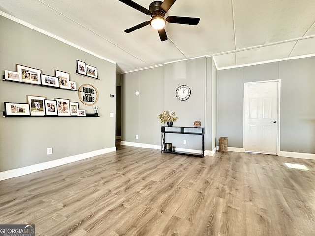 112 Little River Ct, Eatonton, GA 31024 - interior space featuring wood finished floors, a ceiling fan, crown molding, and baseboards