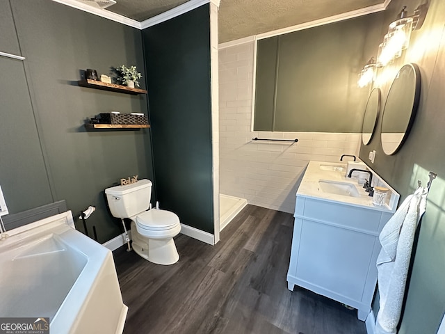 112 Little River Ct, Eatonton, GA 31024 - bathroom with a sink, tiled shower, toilet, a textured ceiling, and wood finished floors