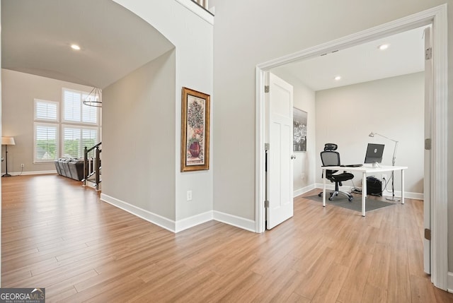 2127 Harmony Dr, Canton, GA 30115 - office space featuring light wood-style floors, baseboards, recessed lighting, arched walkways, and a chandelier