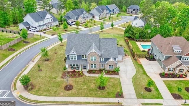 2127 Harmony Dr, Canton, GA 30115 - aerial perspective of suburban area with a pool