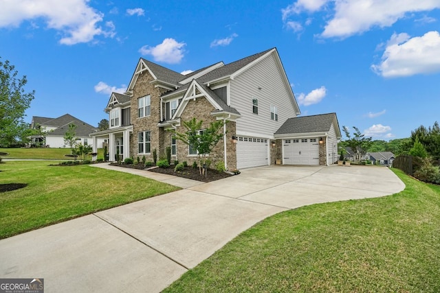 2127 Harmony Dr, Canton, GA 30115 - view of property exterior with a lawn, driveway, a garage, brick siding, and stone siding