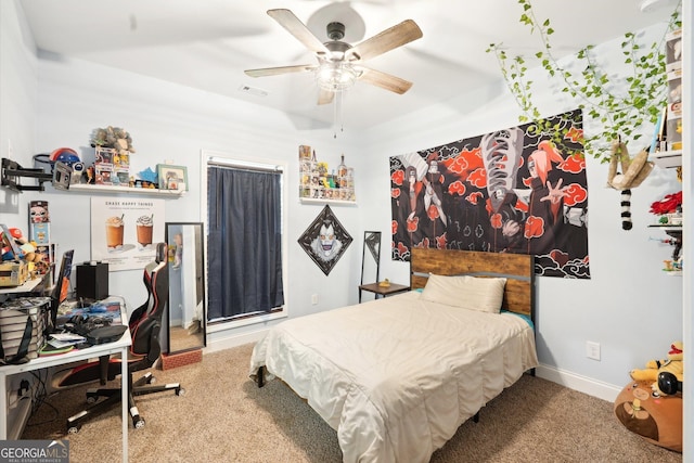 bedroom featuring carpet flooring, a ceiling fan, baseboards, and visible vents