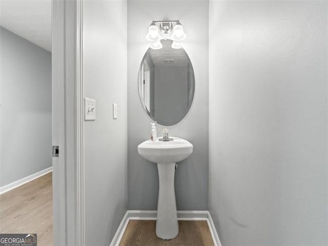 4643 Grand Central Pkwy, Decatur, GA 30035 - bathroom featuring wood finished floors and baseboards