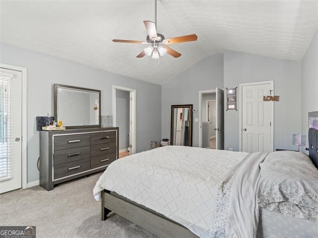 4643 Grand Central Pkwy, Decatur, GA 30035 - bedroom with vaulted ceiling, light carpet, baseboards, and a ceiling fan