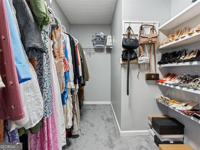 4643 Grand Central Pkwy, Decatur, GA 30035 - walk in closet featuring carpet flooring