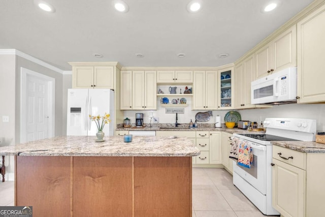 84 Weatherly Rd, Clarkesville, GA 30523 - kitchen with white appliances, a sink, light stone counters, and cream cabinets