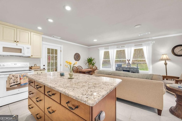 84 Weatherly Rd, Clarkesville, GA 30523 - kitchen with ornamental molding, visible vents, white appliances, and a kitchen island
