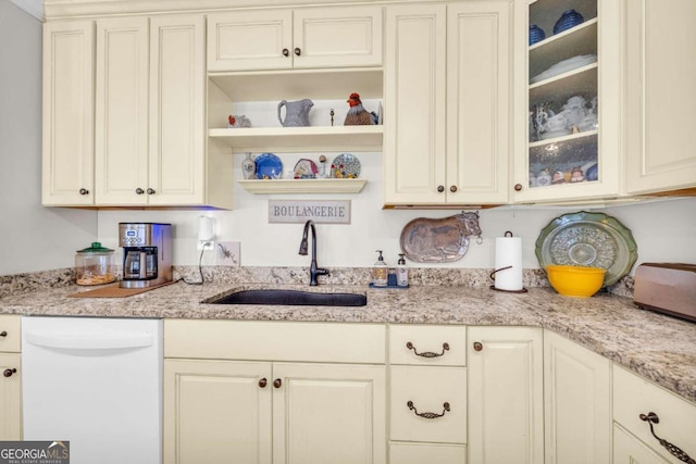 84 Weatherly Rd, Clarkesville, GA 30523 - kitchen with glass insert cabinets, dishwasher, a sink, and light stone counters