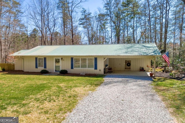 84 Weatherly Rd, Clarkesville, GA 30523 - ranch-style house with a carport, a front lawn, driveway, and metal roof
