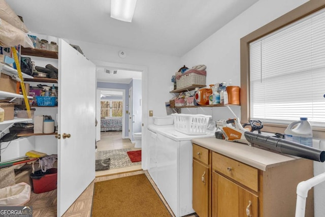 84 Weatherly Rd, Clarkesville, GA 30523 - laundry room with washing machine and clothes dryer and cabinet space