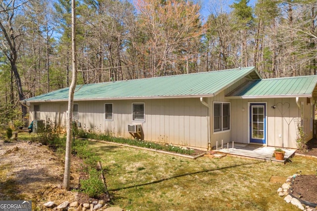 84 Weatherly Rd, Clarkesville, GA 30523 - back of property featuring a yard, cooling unit, and metal roof
