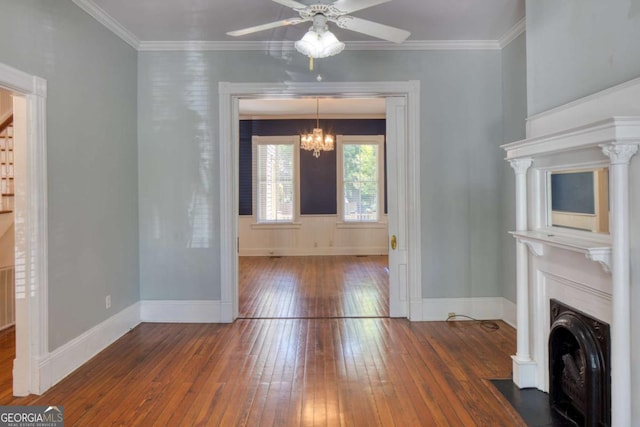 unfurnished living room with a fireplace with flush hearth, hardwood / wood-style floors, ornamental molding, baseboards, and ceiling fan with notable chandelier