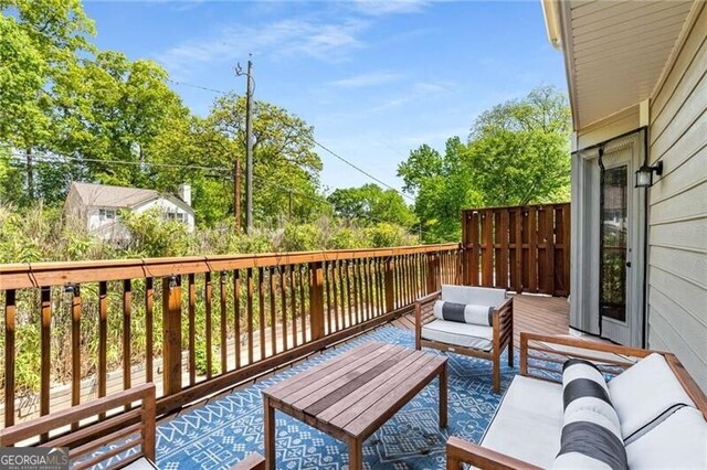 1420 Defoors Dr NW, Atlanta, GA 30318 - wooden deck with outdoor lounge area