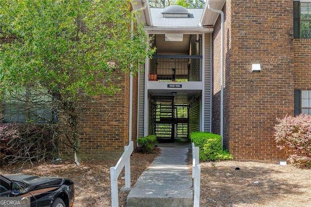 110 Barrington Hills Dr Unit 110, Atlanta, GA 30350 - doorway to property with brick siding