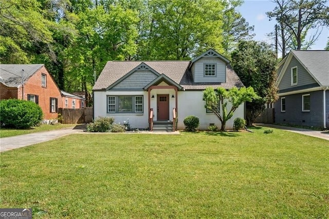 1535 Deerwood Dr, Decatur, GA 30030 - view of front of property featuring concrete driveway, fence, and a front yard