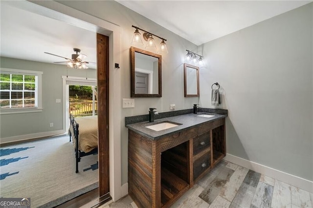 1535 Deerwood Dr, Decatur, GA 30030 - full bath featuring ceiling fan, baseboards, a sink, and double vanity