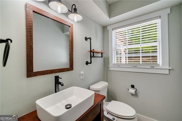 1535 Deerwood Dr, Decatur, GA 30030 - bathroom with baseboards, vanity, and toilet