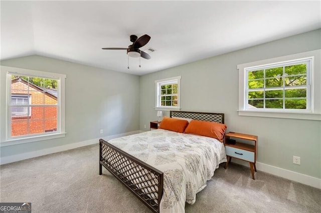 1535 Deerwood Dr, Decatur, GA 30030 - carpeted bedroom with vaulted ceiling, a ceiling fan, and baseboards