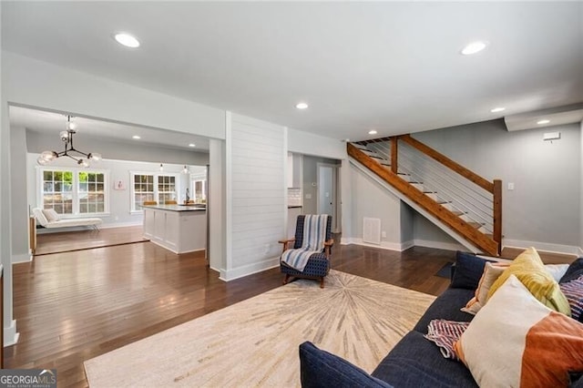 1535 Deerwood Dr, Decatur, GA 30030 - living room with visible vents, baseboards, recessed lighting, wood finished floors, and stairs
