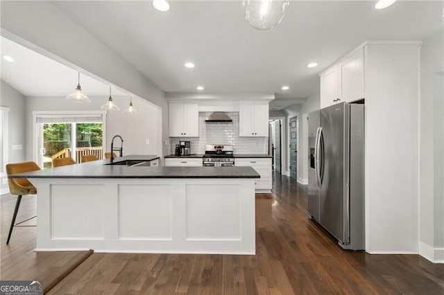 1535 Deerwood Dr, Decatur, GA 30030 - kitchen featuring white cabinets, stainless steel appliances, a sink, dark countertops, and dark wood-type flooring