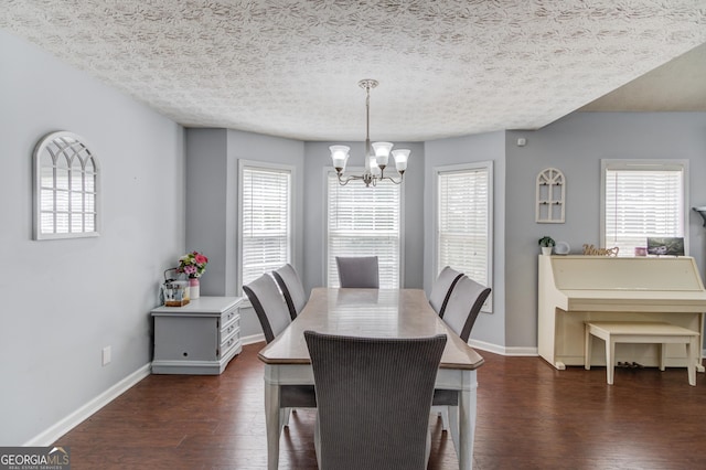 3095 Willow Park Dr, Dacula, GA 30019 - dining room with a chandelier, dark wood finished floors, a wealth of natural light, and baseboards
