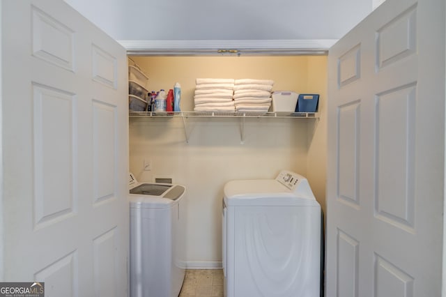 3095 Willow Park Dr, Dacula, GA 30019 - washroom with baseboards, washer and clothes dryer, laundry area, and light tile patterned floors