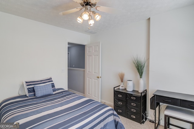 3095 Willow Park Dr, Dacula, GA 30019 - bedroom featuring light carpet, a ceiling fan, a textured ceiling, and baseboards