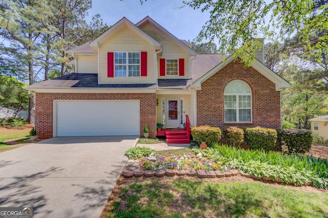 3095 Willow Park Dr, Dacula, GA 30019 - traditional-style house featuring brick siding, an attached garage, driveway, and a chimney