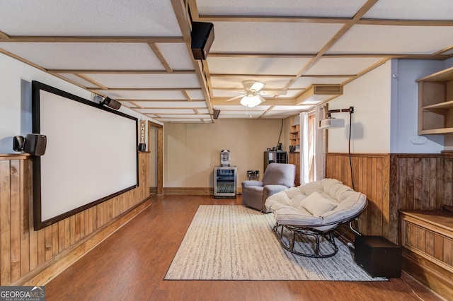 3095 Willow Park Dr, Dacula, GA 30019 - cinema with wainscoting, ceiling fan, wood finished floors, and wooden walls