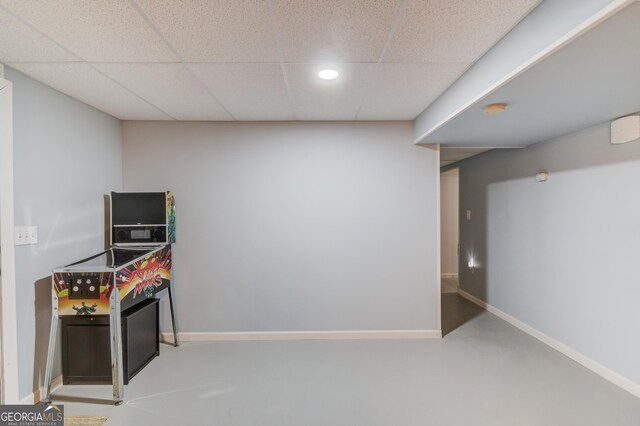 3095 Willow Park Dr, Dacula, GA 30019 - game room with baseboards, finished concrete floors, a paneled ceiling, and recessed lighting