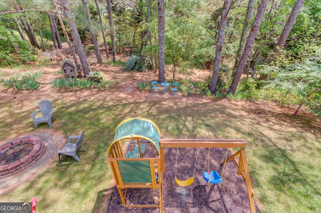 3095 Willow Park Dr, Dacula, GA 30019 - view of yard with a playground and an outdoor fire pit