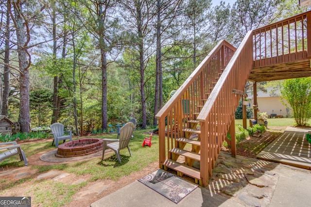 3095 Willow Park Dr, Dacula, GA 30019 - exterior space with a wooden deck, an outdoor fire pit, and stairway