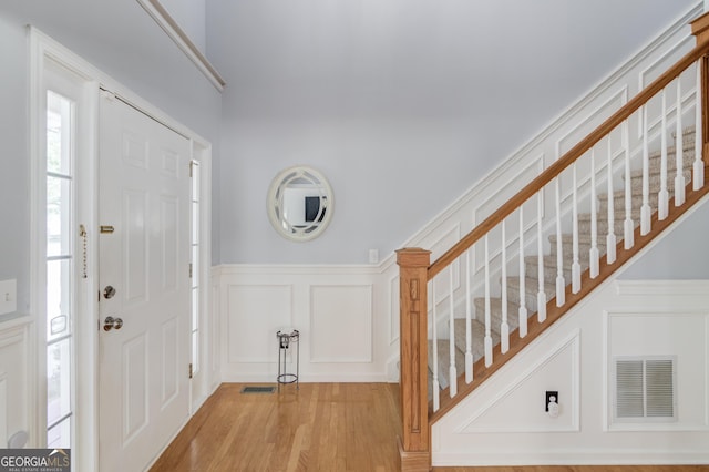 3095 Willow Park Dr, Dacula, GA 30019 - foyer featuring visible vents, stairs, and a decorative wall