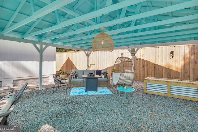 view of patio / terrace with a fenced backyard and an outdoor living space