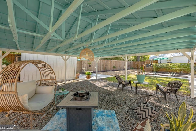 view of patio featuring a fenced backyard and an outdoor hangout area