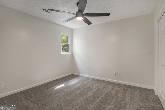 535 Emerald Pkwy, Sugar Hill, GA 30518 - unfurnished room featuring ceiling fan, a textured ceiling, carpet, and baseboards