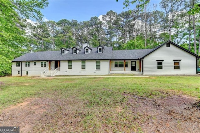 780 N Ola Rd, Mcdonough, GA 30252 - rear view of property featuring a yard and roof with shingles