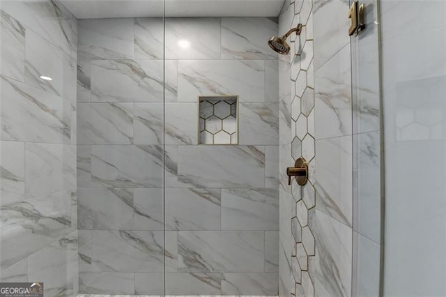 780 N Ola Rd, Mcdonough, GA 30252 - bathroom with a tile shower