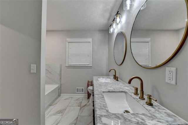 780 N Ola Rd, Mcdonough, GA 30252 - full bath featuring visible vents, a sink, marble finish floor, and double vanity