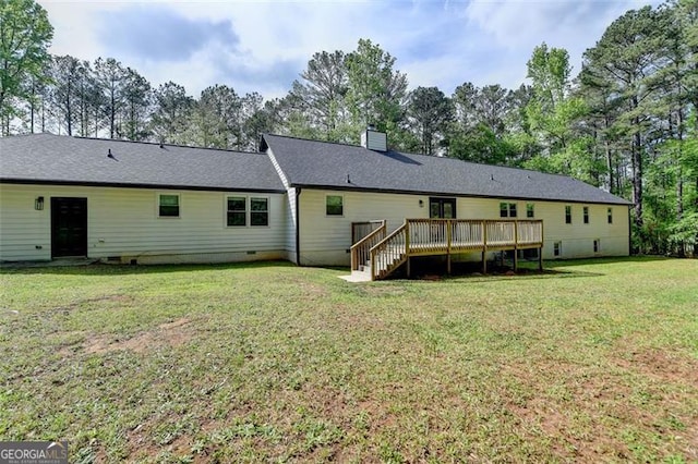 780 N Ola Rd, Mcdonough, GA 30252 - back of house featuring crawl space, a chimney, a shingled roof, a yard, and a wooden deck