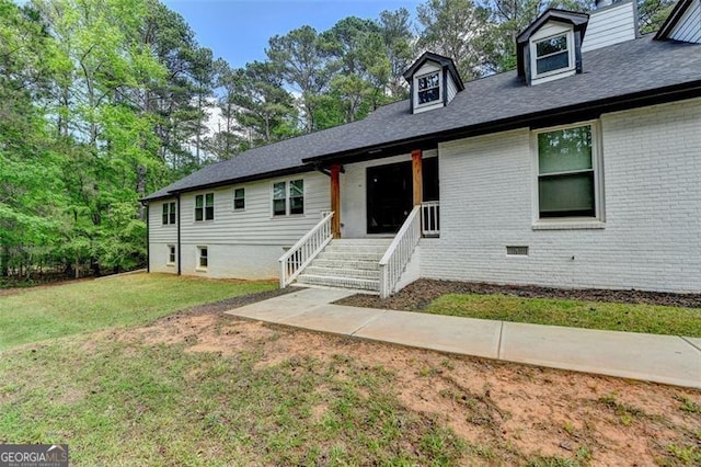 780 N Ola Rd, Mcdonough, GA 30252 - view of front of home featuring brick siding and a front yard