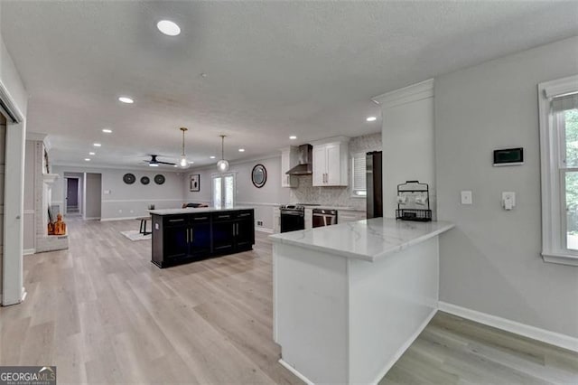 780 N Ola Rd, Mcdonough, GA 30252 - kitchen with recessed lighting, wall chimney range hood, dark cabinets, and electric range